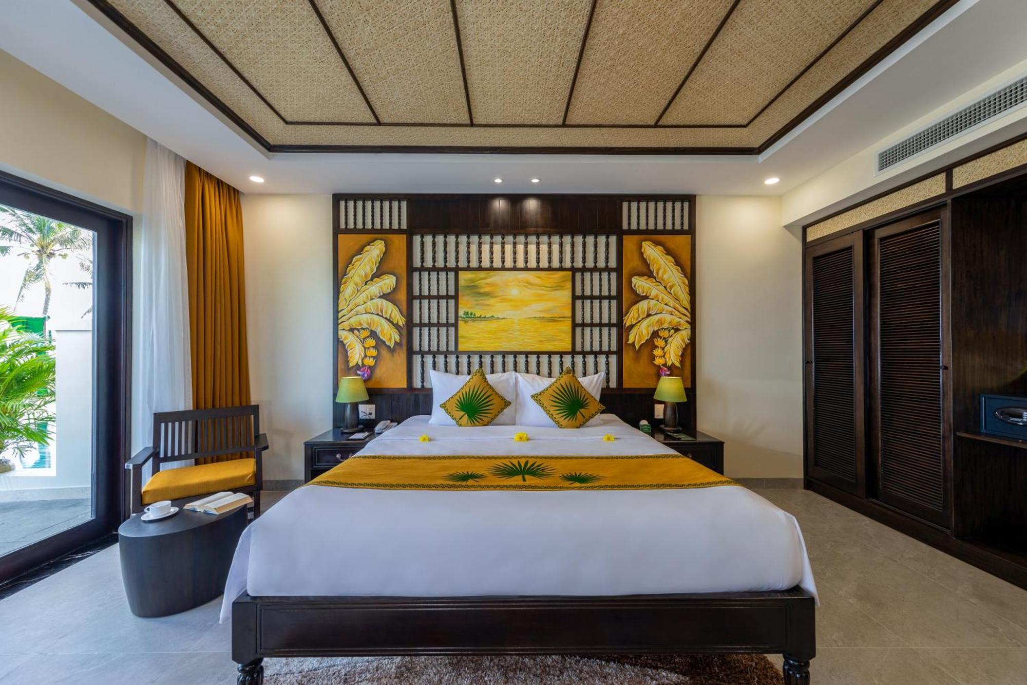 ปาล์ม การ์เด้ Hotel ฮอยอัน ภายนอก รูปภาพ A bedroom at the resort